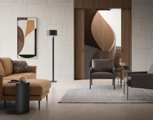 Poltroncina Andy in ecopelle con struttura in metallo di Le Comfort