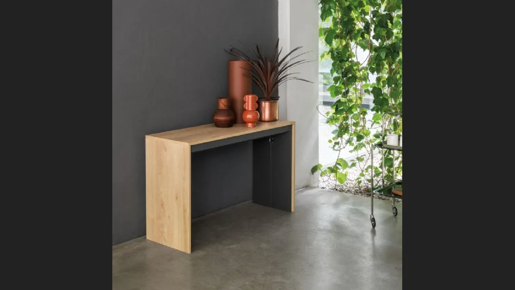 Consolle allungabile con top e cinque allunghe realizzate in laminato ecologico Leonardo di Pezzani